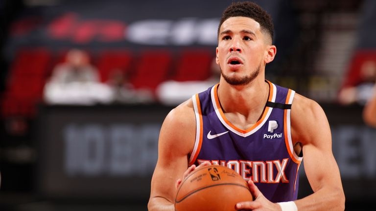 Devin Booker shoots a free-throw during the victory over the Portland Trail Blazers