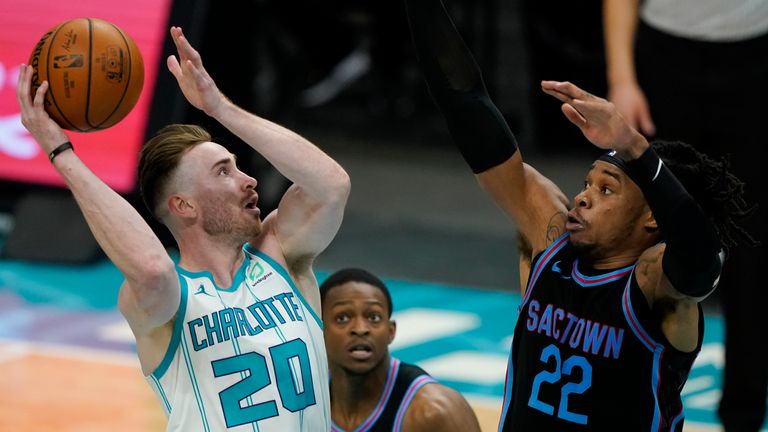 Charlotte Hornets forward Gordon Hayward shoots over Sacramento Kings center Richaun Holmes during the second half of an NBA basketball game on Monday, March 15, 2021, in Charlotte, N.C.