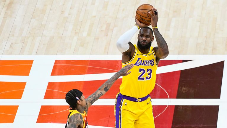 LeBron James shoots over Jordan Clarkson during the Jazz&#39;s 114 - 89 win over Los Angeles Lakers