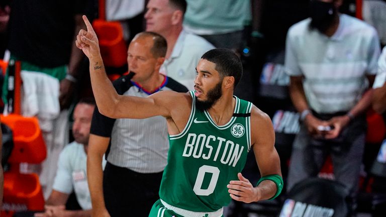 Boston Celtics forward Jayson Tatum (0) gesture after a basket against the Toronto Raptors during the first half of an NBA conference semifinal playoff basketball game Wednesday, Sept. 9, 2020, in Lake Buena Vista, Fla.