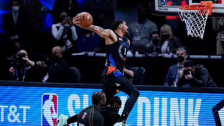 New York Knicks' Obi Toppin competes in the Slam Dunk contest during basketball's NBA All-Star Game in Atlanta, Sunday, March 7, 2021.