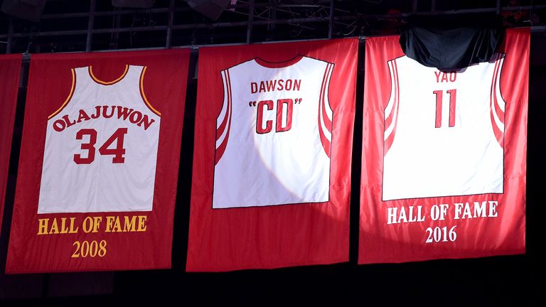 Former Houston Rockets center Yao Ming's retired jersey is revealed from the rafters at halftime during a game between the Houston Rockets and the Chicago Bulls in 2017