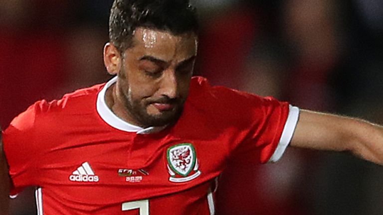 Trinidad and Tobago Levi Garcia (left) Wales' Neil Taylor (right) battle for the ball during the International Friendly match at the Racecourse Ground, Wrexham. PRESS ASSOCIATION Photo. Picture date: Wednesday March 20, 2019. See PA story SOCCER Wales. Photo credit should read: Nick Potts/PA Wire. RESTRICTIONS: Use subject to restrictions. Editorial use only. No commercial use.