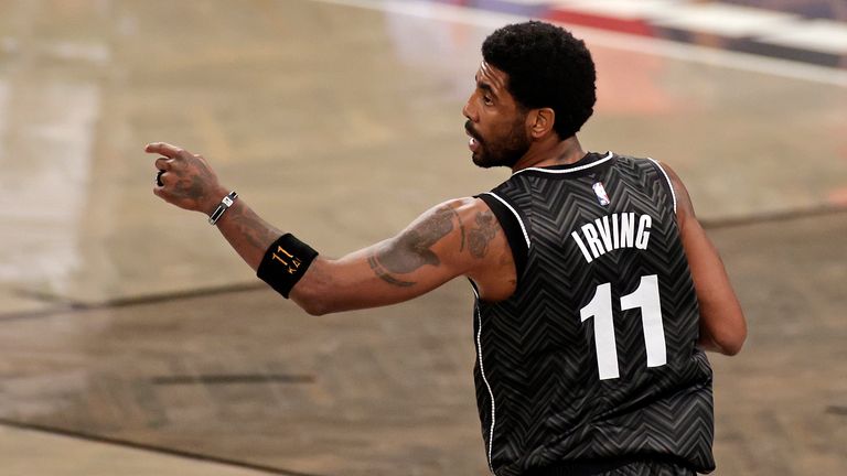 Brooklyn Nets guard Kyrie Irving (11) reacts against the Boston Celtics