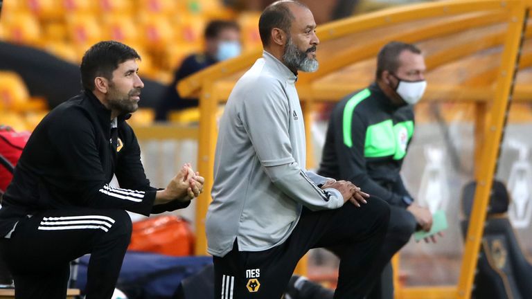 Wolves boss Nuno Espirito Santo takes a knee (PA)