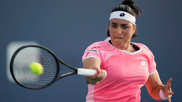 Ons Jabeur, of Tunisia, returns a shot from Sofia Kenin during the Miami Open tennis tournament, Sunday, March 28, 2021, in Miami Gardens, Fla. (AP Photo/Wilfredo Lee)