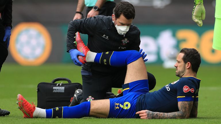PA - Danny Ings receives treatment on the pitch
