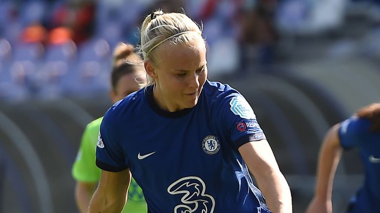 Pernille Harder slides home a first-half penalty against Wolfsburg