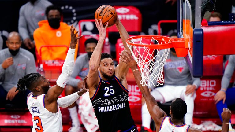 AP - Philadelphia 76ers&#39; Ben Simmons (25) goes up for a dunk between New York Knicks&#39; Nerlens Noel (3) and Alec Burks (18) 