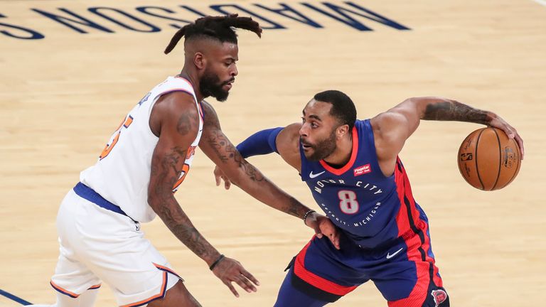 Detroit Pistons guard Wayne Ellington is guarded by New York Knicks forward Reggie Bullock in the second quarter at Madison Square Garden