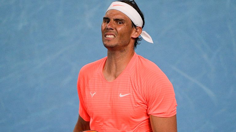 Spain's Rafael Nadal reacts after losing a point against Greece's Stefanos Tsitsipas during their quarterfinal match at the Australian Open tennis championship in Melbourne, Australia, Wednesday, Feb. 17, 2021.(AP Photo/Andy Brownbill)