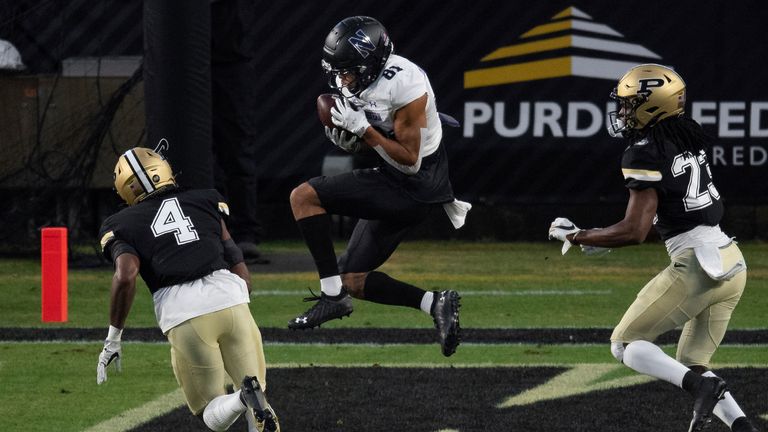Bowman hauls in the touchdown against Purdue (Photo by Zach Bolinger/Icon Sportswire via AP) 