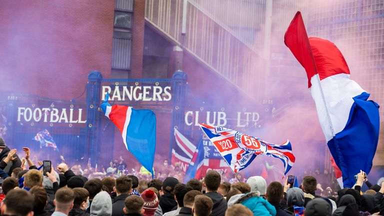 GLASGOW, SCOTLAND - MARCH 06: Rangers fans greet the arrival of their players and manager pre match during a Scottish Premiership match between Rangers and St Mirren at Ibrox Stadium, on March 06, 2021, in Glasgow, Scotland. (Photo by Craig Williamson / SNS Group)