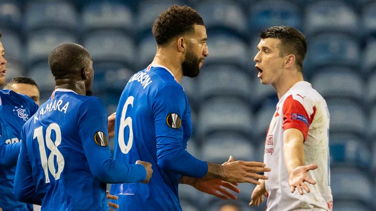 Rangers&#39; Connor Goldson (left) and Glen Kamara take exception to something said by Slavia&#39;s Ondre Kudela