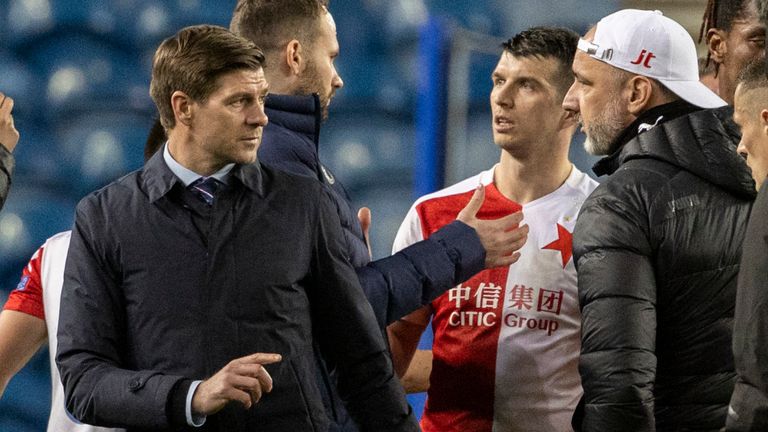 SNS - Rangers manager Steven Gerrard exchanges words with Slavia Prague manager Jindrich Trpisovsky after their exit rom the Europa League