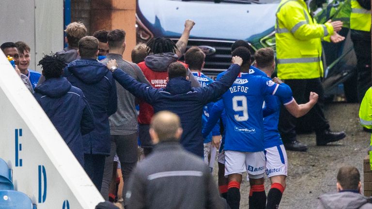 GLASGOW, SCOTLAND - MARCH 06: Rangers' players celebrate at full time with the fans outside during a Scottish Premiership match between Rangers and St Mirren at Ibrox Stadium, on March 06, 2021, in Glasgow, Scotland. (Photo by Craig Williamson / SNS Group)