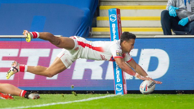 Picture by Allan McKenzie/SWpix.com - 26/03/2021 - Rugby League - Betfred Super League Round 1 - Emerald Headingley Stadium, Leeds, England St Helens v Salford Red Devils - St Helens&#39;s Regan Grace scores a try against Salford.