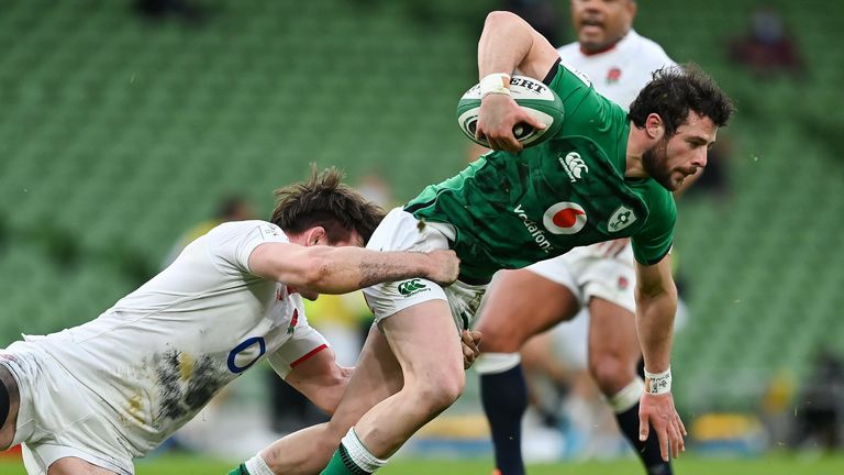 20 March 2021; Robbie Henshaw of Ireland is tackled by Tom Curry of England during the Guinness Six Nations Rugby Championship match between Ireland and England at Aviva Stadium in Dublin. Photo by Brendan Moran/Sportsfile