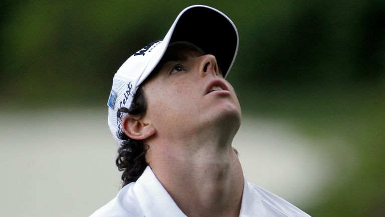 Rory McIlroy, of Northern Ireland, reacts after his putt on the 13th hole during the third round of the Masters