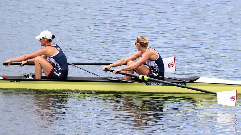 Helen Glover and Heather Stanning, of Britain, celebrate winning gold in the women's rowing pair final during the 2016 Summer Olympics in Rio de Janeiro, Brazil, Friday, Aug. 12, 2016. (Ezra Shaw/Pool Photo via AP)