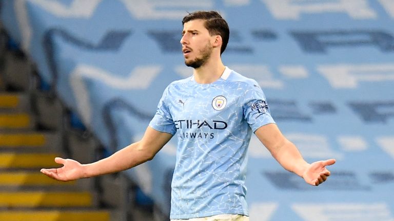 Man City's Ruben Dias gestures during the 2-0 loss to Man Utd (AP)