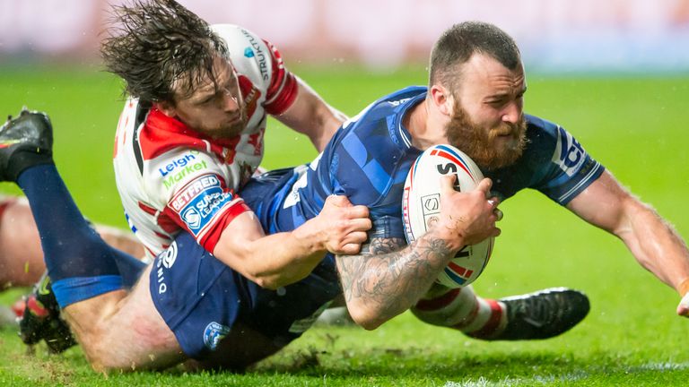 Leigh&#39;s Joe Mellor can&#39;t prevent Wigan&#39;s Jake Bibby from scoring a try