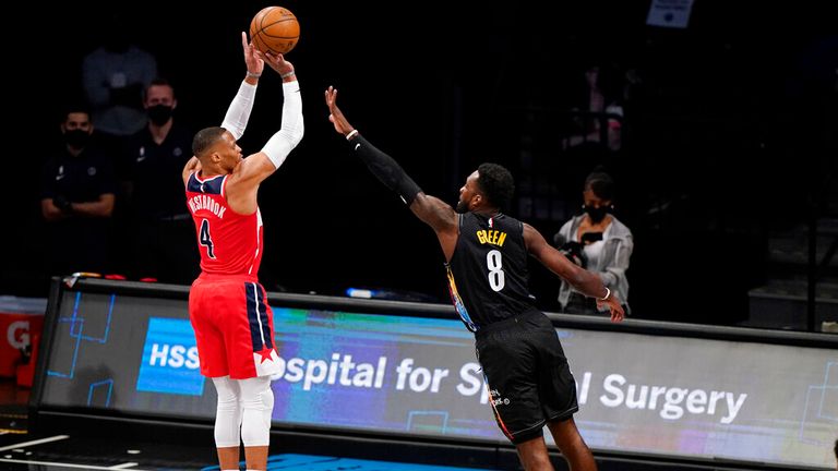 AP - Brooklyn Nets forward Jeff Green (8) defends Washington Wizards guard Russell Westbrook (4) as Westbrook shoots for three points