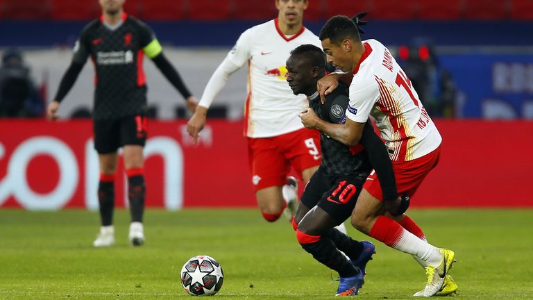 Sadio Mane holds off a challenge from Tyler Adams during Liverpool's Champions League game against RB Leipzig