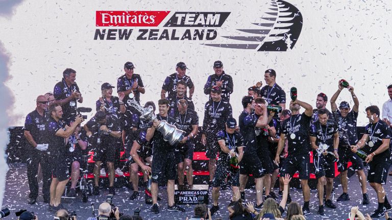 Emirates Team New Zealand celebrating with the Auld Mug after their AC36 victory (Image credit - ACE 36 | Studio Borlenghi)