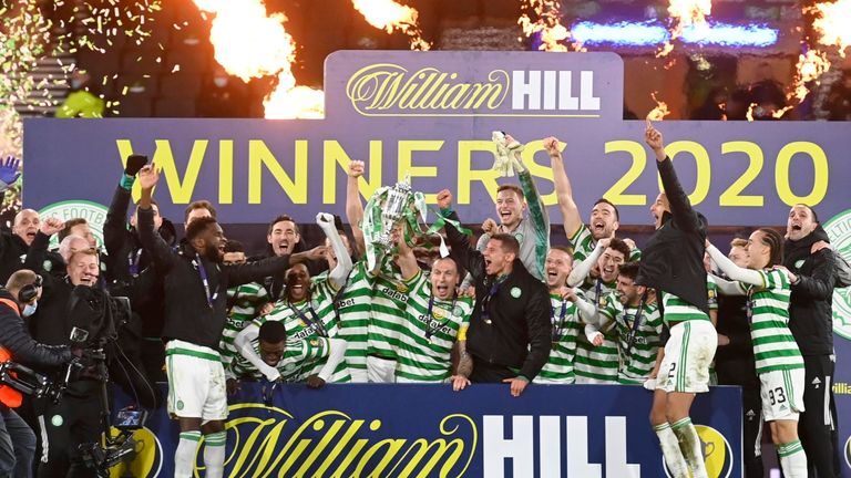 GLASGOW, SCOTLAND - DECEMBER 20: Celtic's Scott Brown lifts the William Hill Scottish Cup during the William Hill Scottish Cup Final between Celtic and Hearts at Hampden Park, on December 20, 2020, in Glasgow, Scotland. (Photo by Rob Casey / SNS Group)