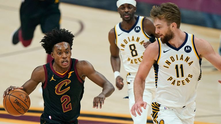 Cleveland Cavaliers&#39; Collin Sexton drives to the basket against Indiana Pacers&#39; Domantas Sabonis