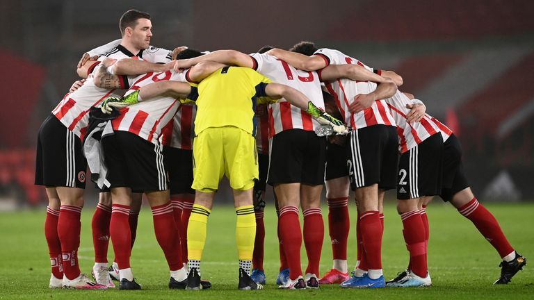 Sheffield United come together in a pre-match huddle at Bramall Lane
