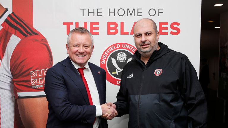 Chris Wilder and Prince Abdullah shake hands on a new four-year deal for the manager in January 2020