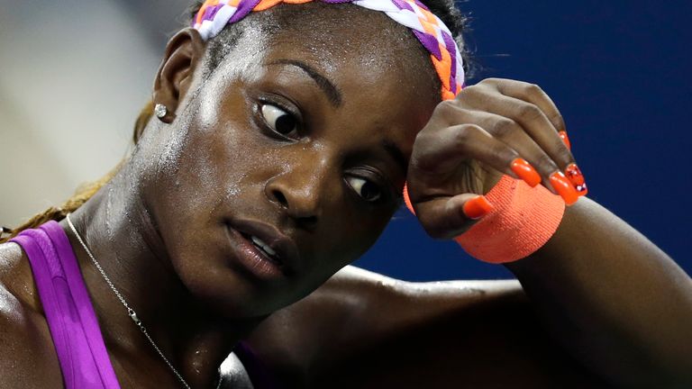 Sloane Stephens, of the United States, wipes her brow in her match to Urszula Radwanska, of Poland, during the second round of the 2013 U.S. Open tennis tournament, early Thursday, Aug. 29, 2013, in New York. (AP Photo/Charles Krupa)