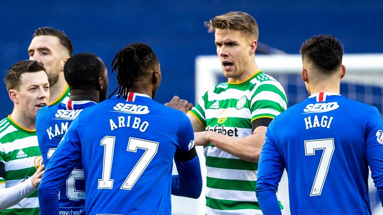 SNS - Celtic's Kris Ajer and Joe Aribo come together during a Scottish Premiership match between Rangers and Celtic at Ibrox