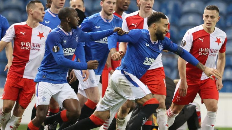 SNS - Rangers&#39; Connor Goldson (right) and Glen Kamara take exception to something said by Slavia&#39;s Ondre Kudela during the UEFA Europa League Round of 16 2nd Leg match with Slavia Prague at Ibrox 