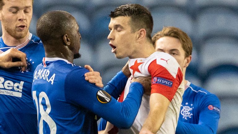 Rangers Glen Kamara grapples with Slavia Prague's Ondrej Kudela during the UEFA Europa League Round of 16 2nd Leg match at Ibrox