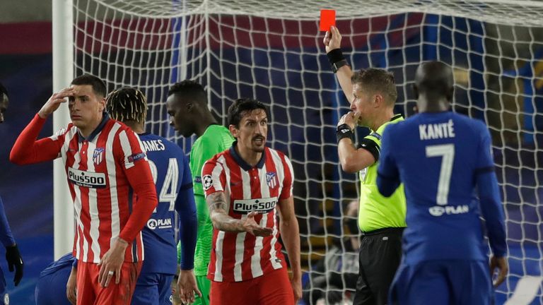 Stefan Savic pleads his innocence as he is shown red after 81 minutes
