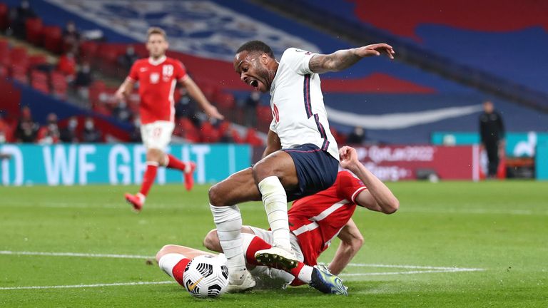 Raheem Sterling is fouled for England's penalty against Poland