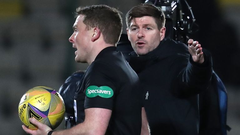 Rangers manger Steven Gerrard speaks to referee John Beaton at half time