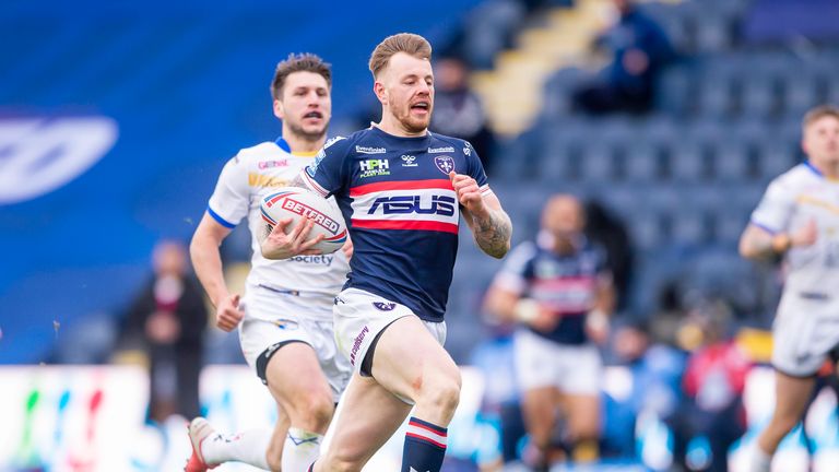 Wakefield's Tom Johnstone outpaces the Leeds defence to score a try.