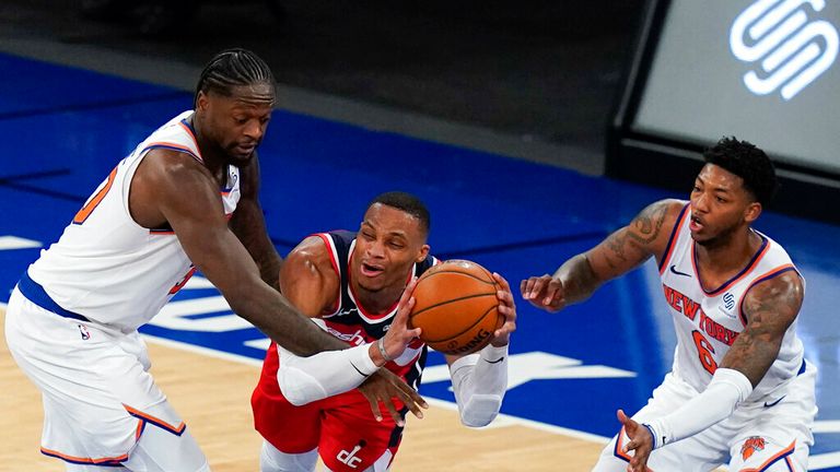 AP - Washington Wizards' Russell Westbrook, center, is defended by New York Knicks' Elfrid Payton, right, and Julius Randle