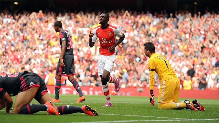 Arsenal&#39;s Yaya Sanogo celebrates scoring his side&#39;s first goal of the game during the Emirates Cup match at The Emirates Stadium, London. PRESS ASSOCIATION Photo. Picture date: Saturday August 2, 2014. See PA story SOCCER Arsenal. Photo credit should read: Andrew Matthews/PA Wire