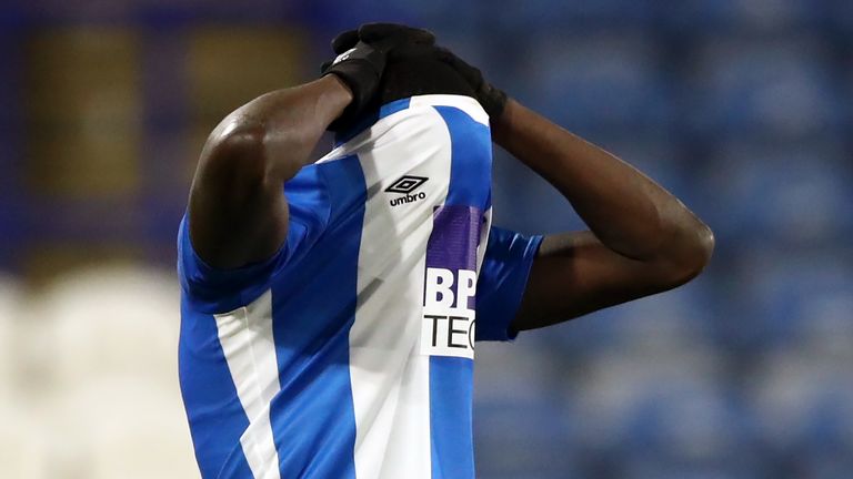 Yaya Sanogo missed a late penalty on his full Huddersfield debut