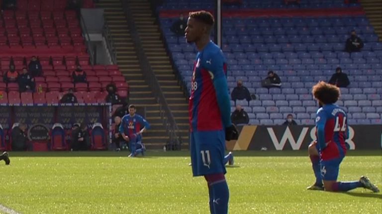 Wilfried Zaha decides to stand instead of taking a knee ahead of Palace&#39;s match with West Brom.