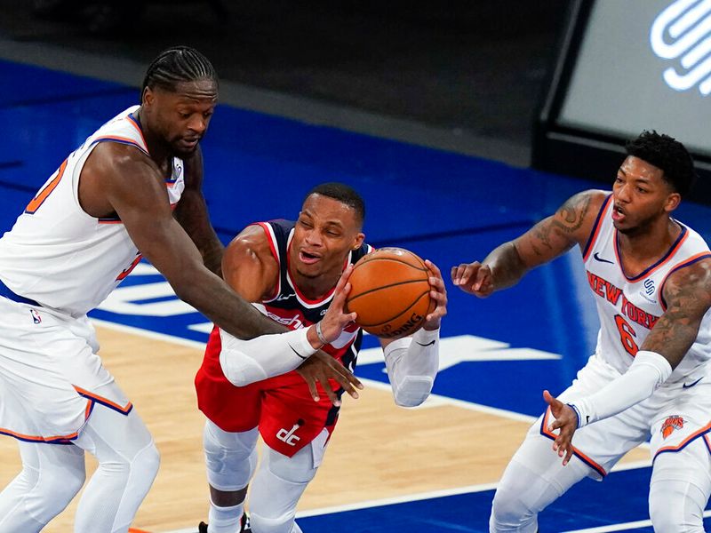 Golden State Warriors center James Wiseman (33) shoots over San Antonio  Spurs forward DeMar DeRozan during the first half of an NBA basketball game  in San Francisco, Wednesday, Jan. 20, 2021. (AP