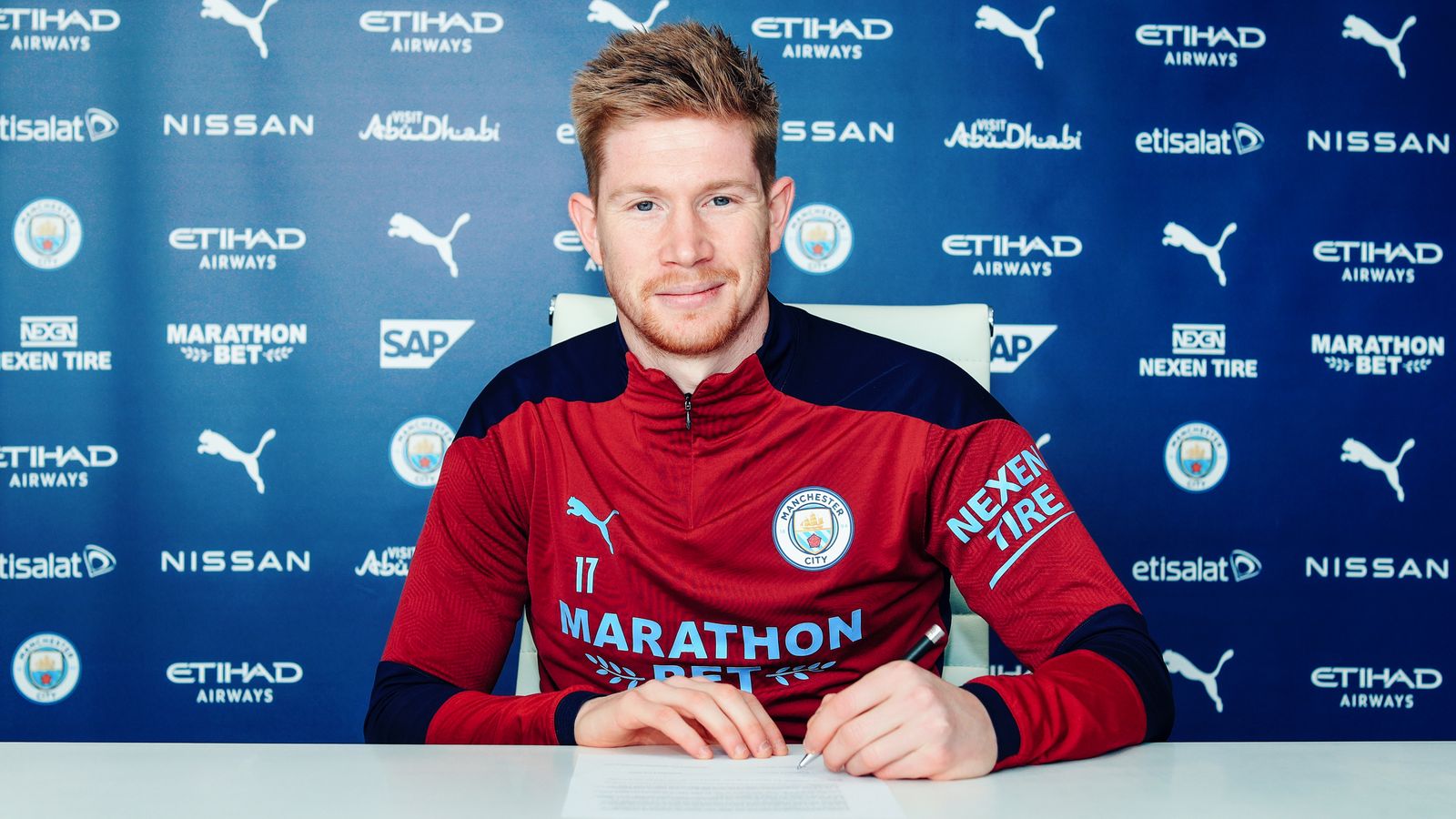 Kevin De Bruyne: Manchester City midfielder signs two-year ...