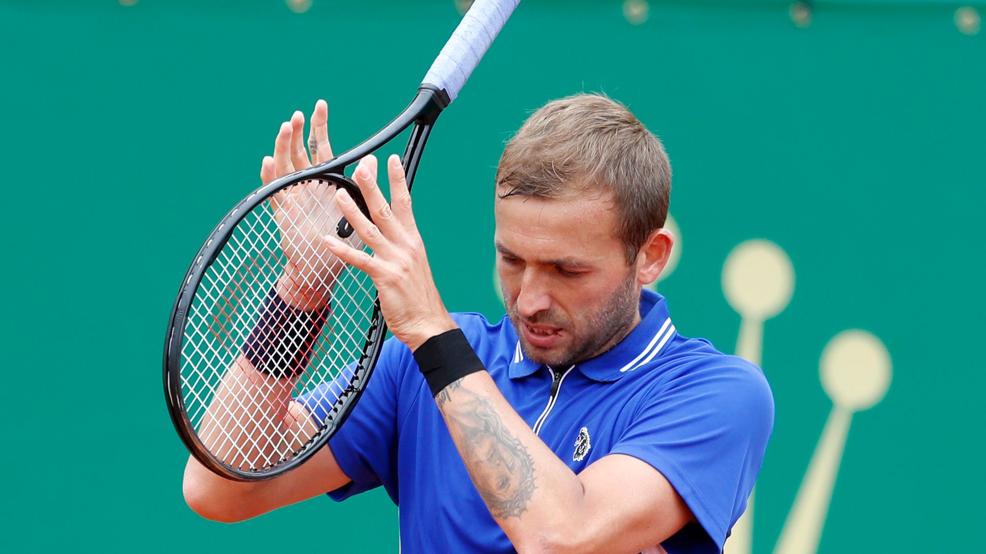 Evans beaten as Djokovic & Nadal return with wins