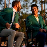 Hideki Matsuyama was presented with the Green Jacket by 2020 champion Dustin Johnson 