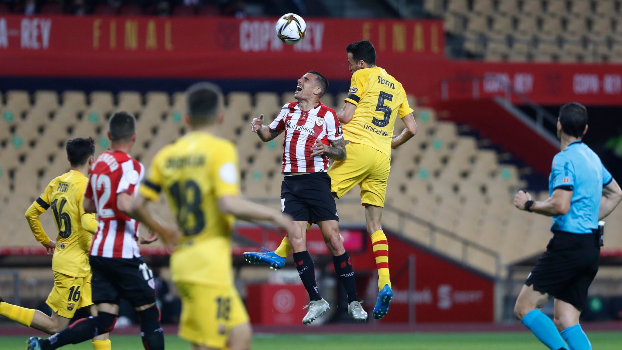 Sergio Busquets fights for the ball against Athletic Bilbao's Inigo Martinez
